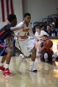 Freshman Darius Hines (4)  led the Cardinals with 12 points in the 58-40 setback to Good Counsel Tuesday.