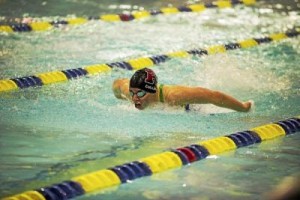 Radnor's Julia Cullun, pictured competing in the 100 butterfly Thursday at the District One Championships, came back Friday to earn a share of fifth place in the 100 free with Strath Haven;s Summer Martin, her Suburban Swim Club teammate, with a time of 51.94. (Rick Kauffman)