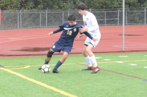 Radnor midfielder Eliot Hayes, right, fending off Spring-Ford’s Sal Ibarra in a postseason game, was one of the Raiders’ top performers in a run to the PIAA Class 4A final. (Thomas Nash – Digital First Media)